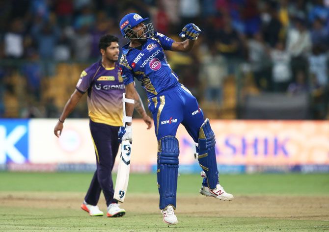 Mumbai Indians' Krunal Pandya exults after hitting the winning runs against Kolkata Knight Riders during Qualifier 2 of the Indian Premier League in Bengaluru on Friday
