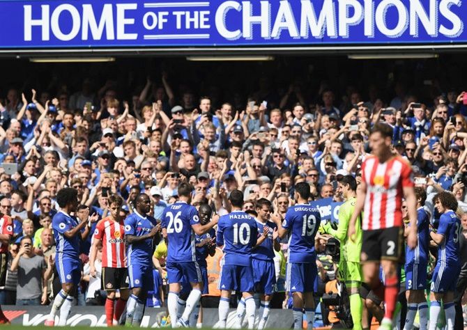 Chelsea players form a guard of honour for John Terry as he leaves the pitch for a last time at Stamford Bridge on Sunday