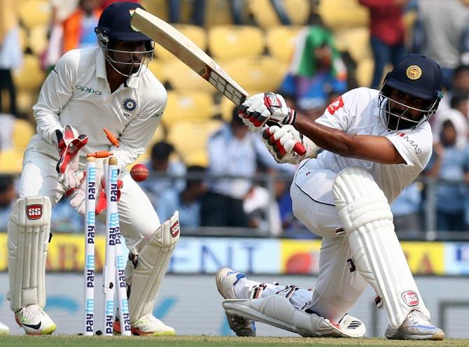 Lahiru Thirimanne is bowled by Ravichandran Ashwin