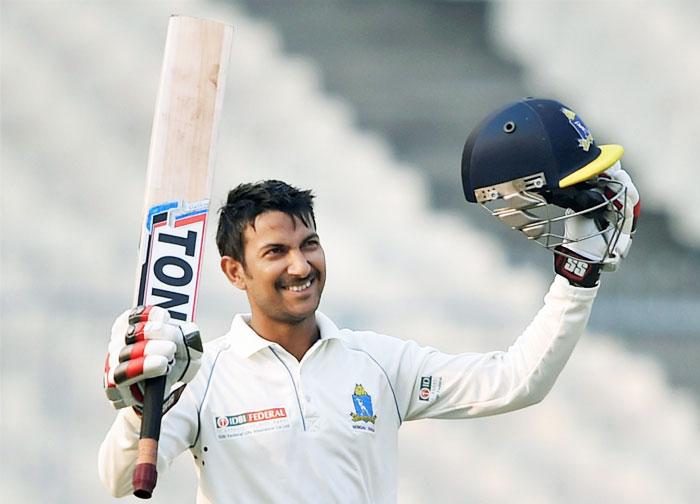 Bengal batsman Anustup Majumdar celebrates his century during the Ranji Trophy match against Goa at Eden Gardens in Kolkata on Saturday