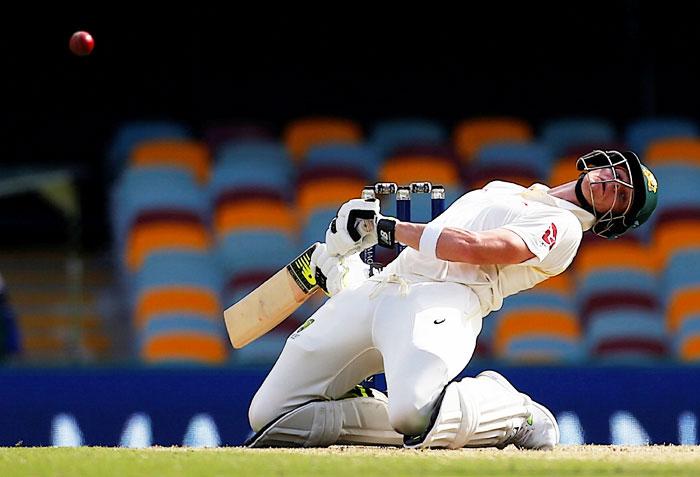 Steve Smith avoids a short delivery from England's Stuart Broad on Day 3 of the first Ashes Test at the Gabba in Brisbane on Saturday