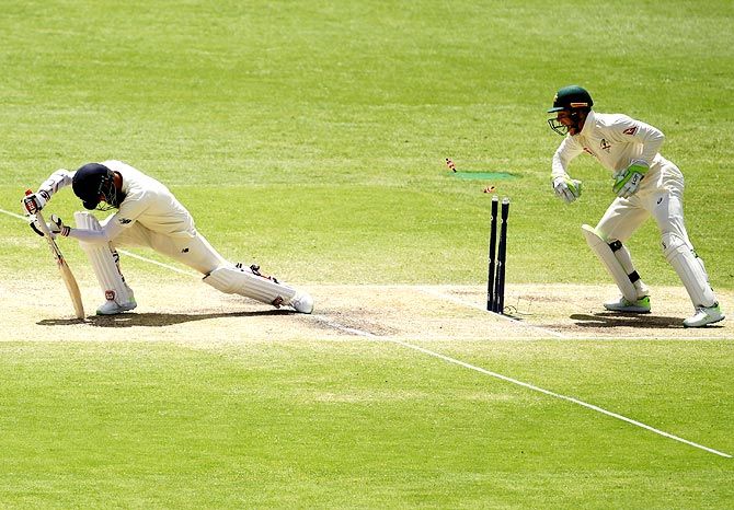 England's Moeen Ali is stumped by Australia wicketkeeper Tim Paine during Day 4 of the first Ashes Test