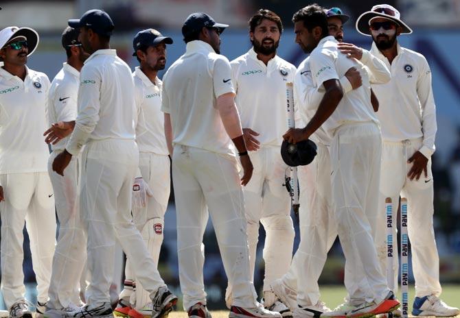 Ravichandran Ashwin gets a hug from Captain Virat Kohli as Team India celebrate winning the Nagpur Test against Sri Lanka, November 27, 2017. Photograph: BCCI