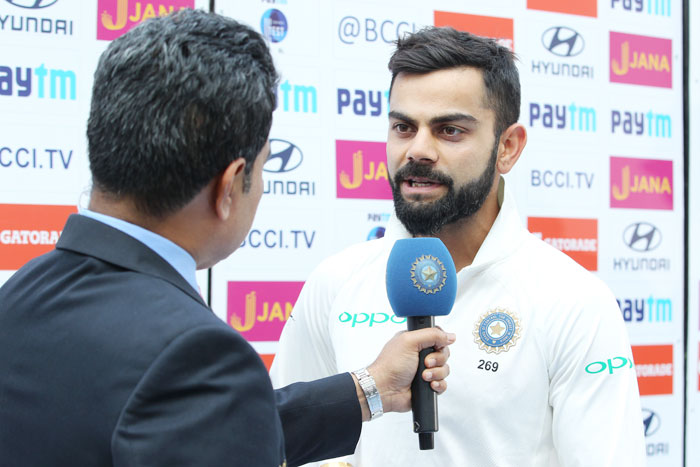 Virat Kohli speaks during the post-match presentation ceremony on Monday