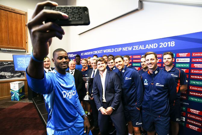 West Indies' Jason Holder takes a selfie during the official event launch of the ICC Under-19 Cricket World Cup in New Zealand at Basin Reserve in Wellington on Thursday