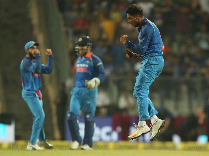 Kuldeep Yadav celebrates the dismissal of Kane Williamson