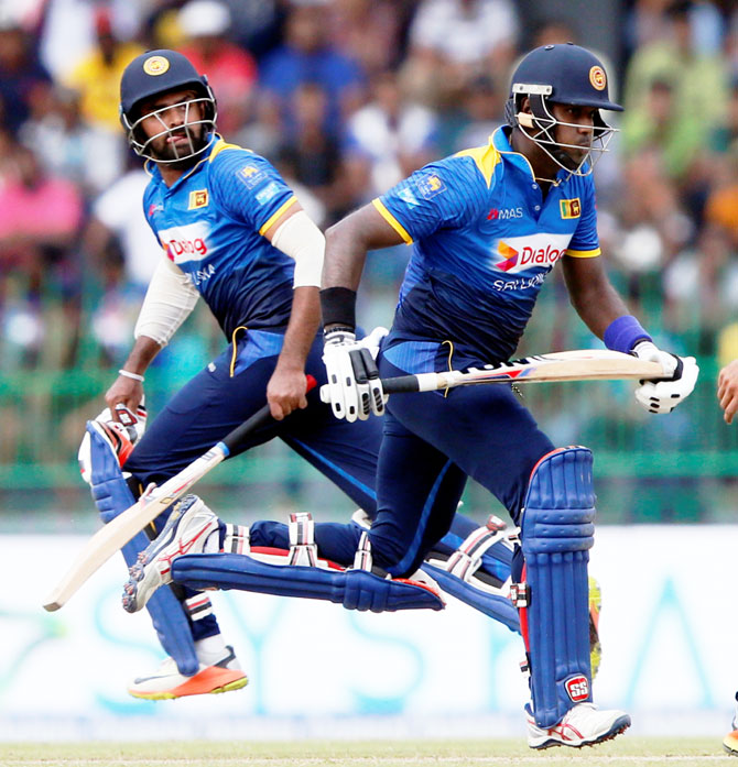 Sri Lanka's Angelo Mathews and Lahiru Thirimanne run between wickets