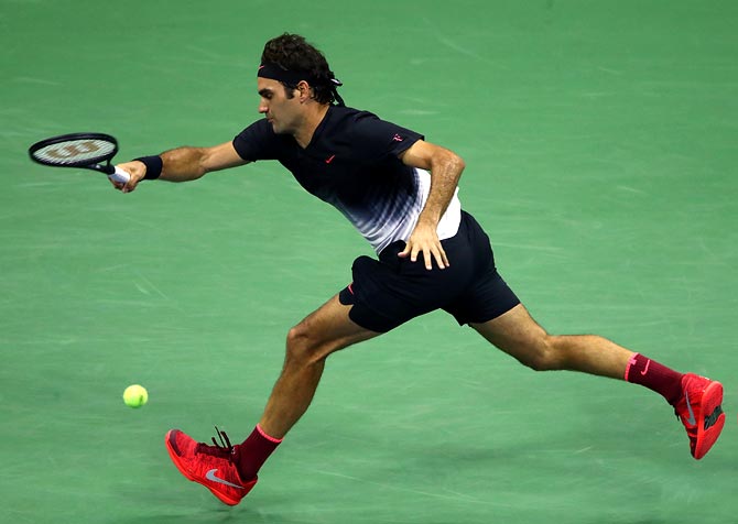 US Open PIX: Ailing Del Potro survives, Federer eases through - Rediff ...