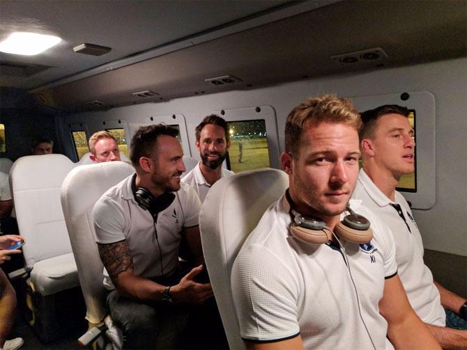 Players of World XI, including captain Faf Du Plessis (left) arrive in Lahore on Monday for the T20 series against Pakistan