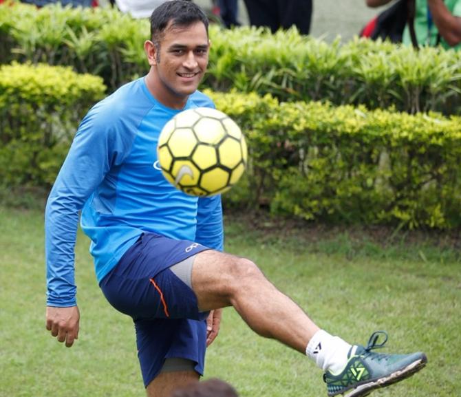 Dhoni plays football