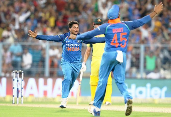 Kuldeep Yadav celebrates his hat-trick wicket during the 2nd ODI against Australia at the Eden Gardens in Kolkata on Thursday