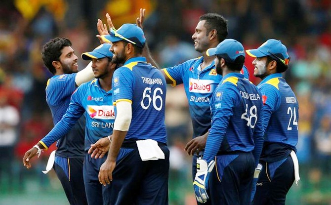 Sri Lanka's players celebrate a dismissal during the recent ODI series against India