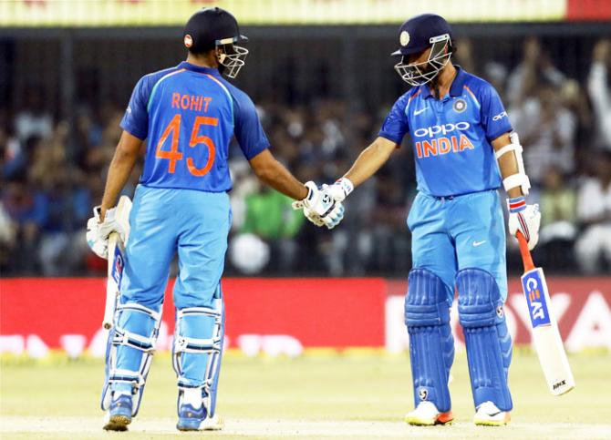 Rohit Sharma congratulates Ajinkya Rahane on completing his half-century