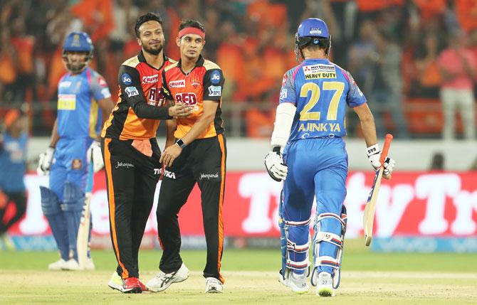 Sidh Kaul (right) celebrates with Shakib al Hasan after dismissing Ajinkya Rahane