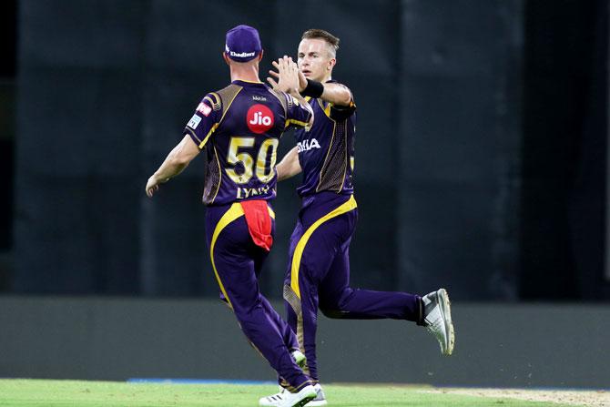 Kolkata Knight Riders' Tom Curran celebrates after taking the wicket of Chennai Superkings' Shane Watson