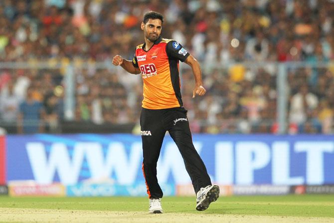 Sunrisers Hyderabad's Bhuvneshwar Kumar celebrates the wicket of Kolkata Knight Riders' Dinesh Karthik