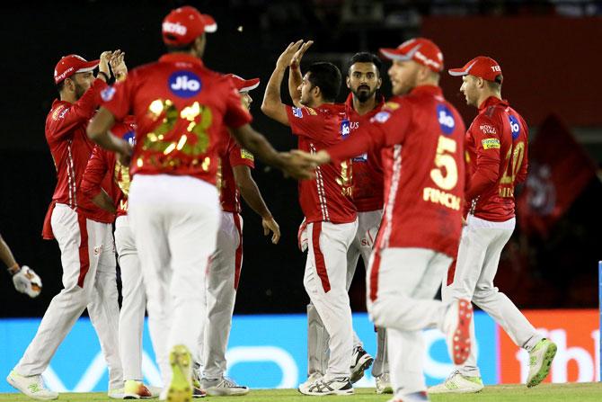 Kings XI Punjab's Mohit Sharma  celebrates the wicket of Sunrisers Hyderabad's Wriddhiman Saha 