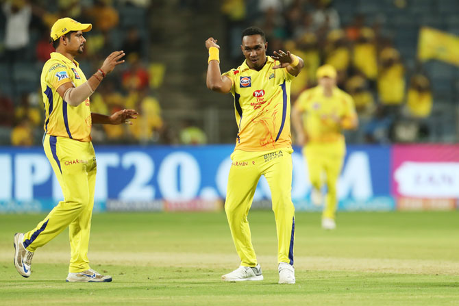 Chennai Super Kings's Dwayne Bravo celebrates the wicket of Rajasthan Royals's Rahul Tripathi