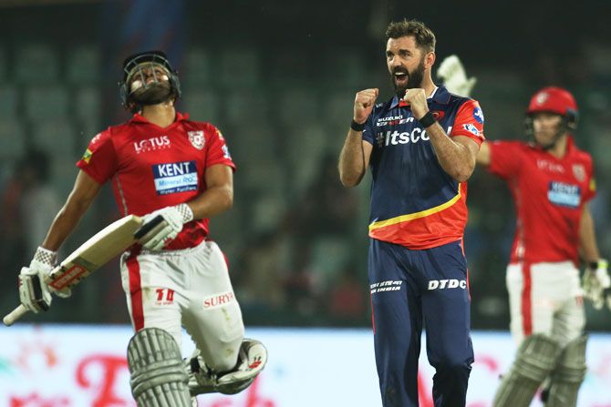 Delhi Daredevils' Liam Plunkett celebrates the wicket of Kings XI Punjab's Karun Nair