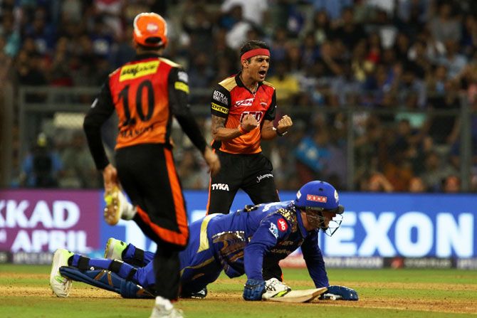Sunrisers Hyderabad's Siddharth Kaul celebrates the wicket of Mumbai Indians' Mitchell McCleneghan 