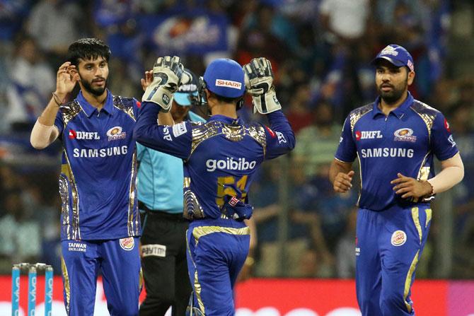 Mumbai Indians' Mayank Markande celebrates the wicket of Sunrisers Hyderabad's Mohammad Nabi 