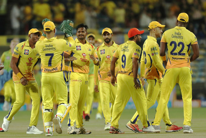 Chennai Super Kings's K M Asif, centre, celebrates after dismissing Delhi Daredevils's Colin Munro