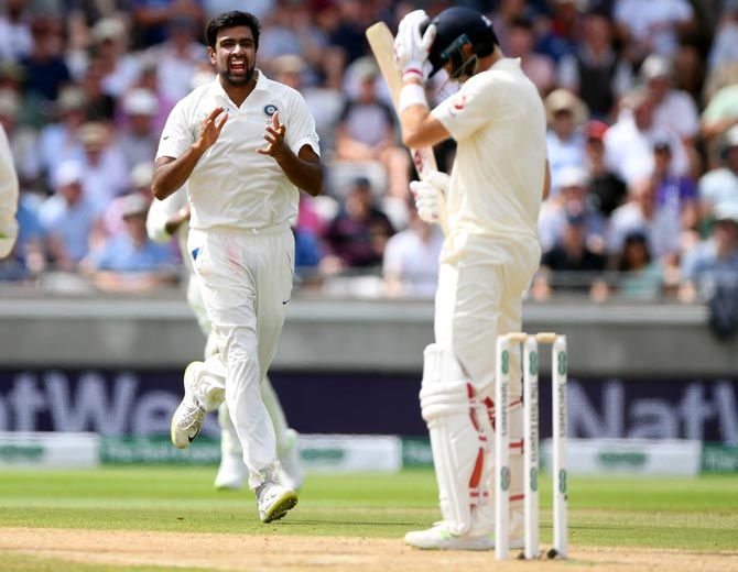 England batsman Joe Root reacts as India bowler Ravi Ashwin celebrates his wicket during day 3 of the First Specsavers Test Match at Edgbaston on Friday