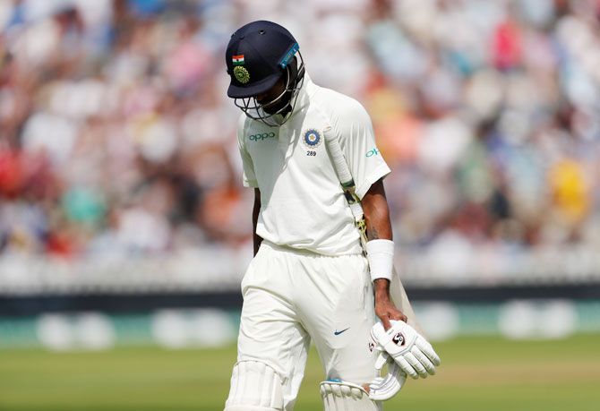 India's Hardik Pandya walks back dejected after his dismissal