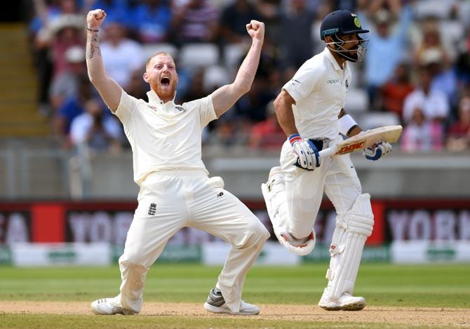 Ben Stokes celebrates the wicket of Virat Kohli