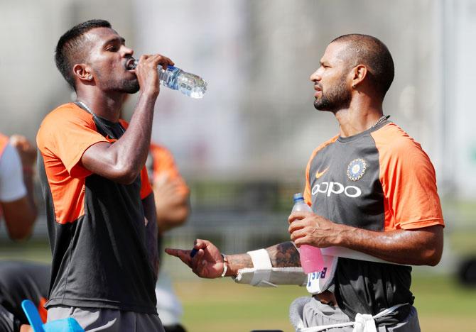 India's Hardik Pandya and Shikhar Dhawan during nets