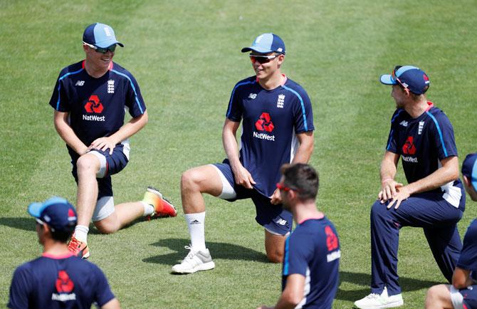 England's Ollie Pope and Sam Curran a practice 