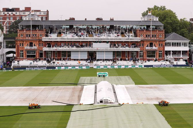 General view of covers on the pitch during a rain delay during the 2nd Test at Lord's in London on Thursday