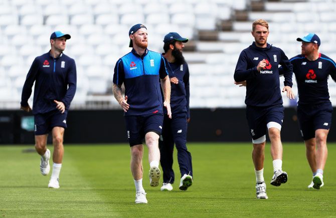 England's Ben Stokes with teammates go through the paces during nets