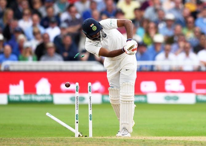 India's Ravichandran Ashwin is bowled by England's Stuart Broad