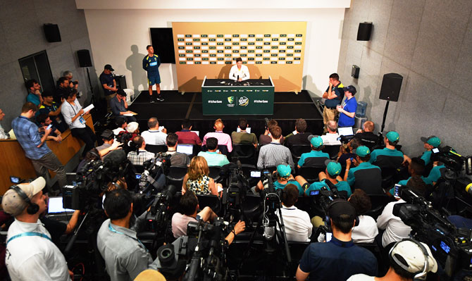 Australia's Tim Paine speaks to the media during a press conference held after an Australian training session at Adelaide Oval as junior Australian crickets watch on Wednesday