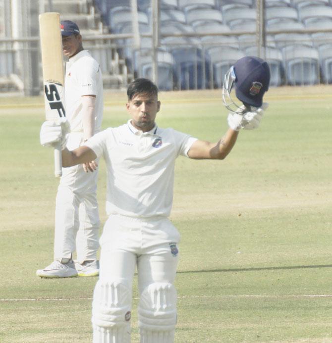 Maharashtra opener Swapnil Gugale celebrates his ton against Mumbai on Thursday