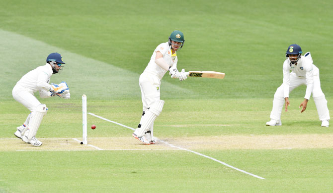 Travis Head lead Australia's fight back with a fighting half-century