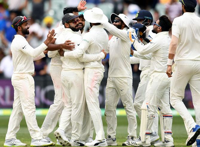 India's players celebrate winning the first Test against Australia in Adelaide, on December 10, 2018