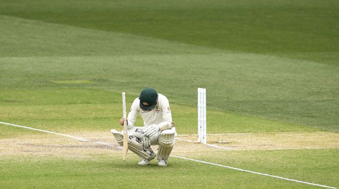 Australia's Nathan Lyon looks dejected after India get the last wicket to win the opening Test in Adelaide on Monday