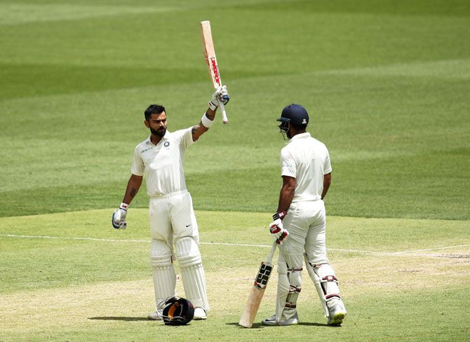India's Virat Kohli celebrates on scoring his century, his 25th in Test cricket
