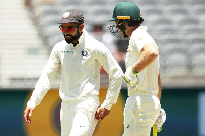 Virat Kohli and Tim Paine 'exchange sweet nothings'