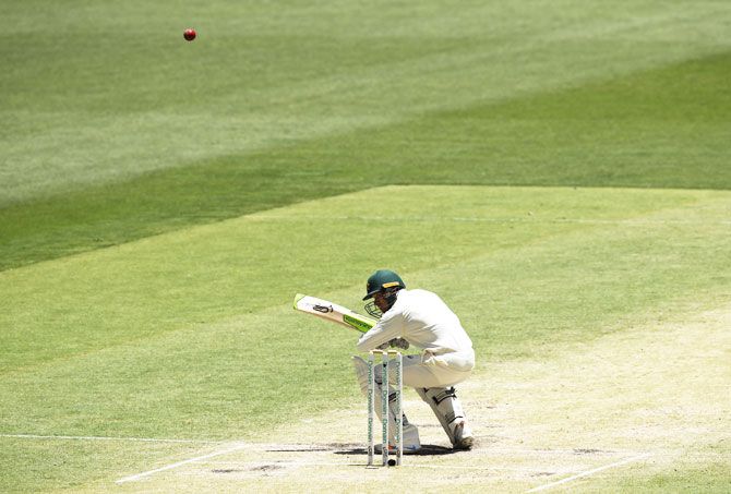 Australia's Usman Khawaja avoids a short ball from India's Ishant Sharma