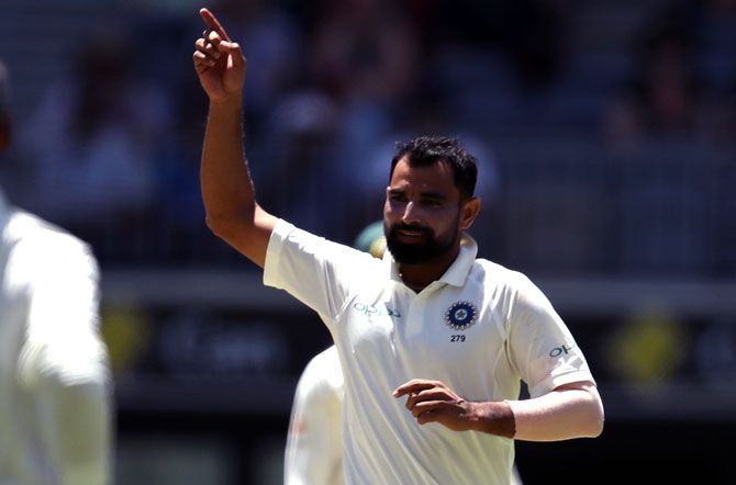 Mohammed Shami celebrates Tim Paine's wicket. Photograph: Cameron Spencer / Getty Images