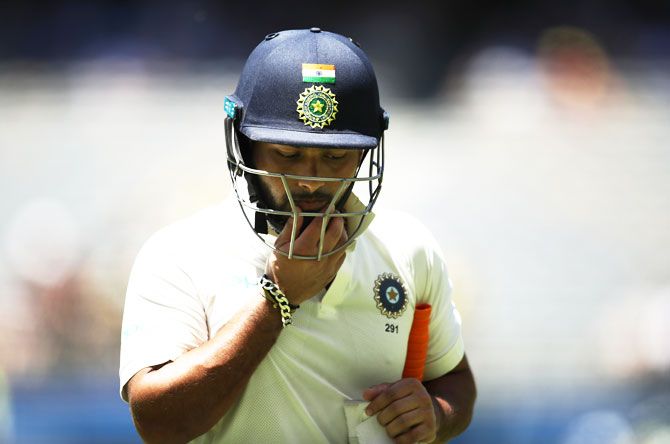 Rishabh Pant walks off after being dismissed by Nathan Lyon for 30