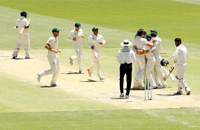 Australia players celebrate after winning the second Test against India on Tuesday