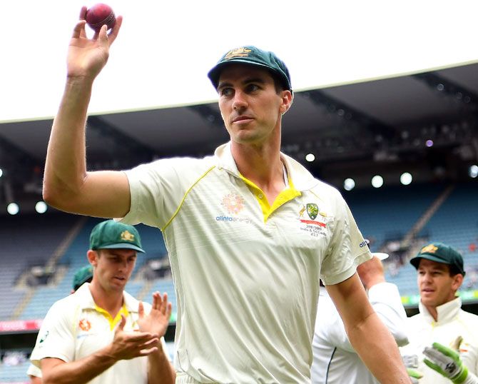 Pat Cummins celebrates taking six wickets in the second innings. Photograph: Michael Dodge/Getty Images