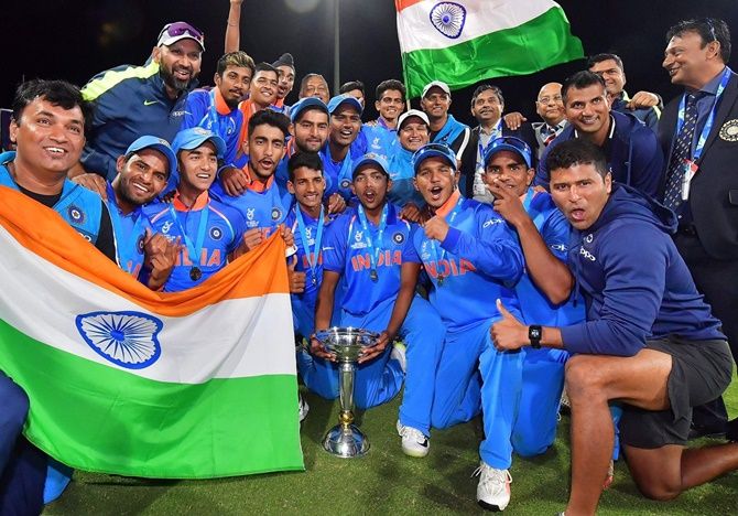 India's victorious Under-19 team, with coach Rahul Dravid and the support staff, after being crowned World champions in February 2018.