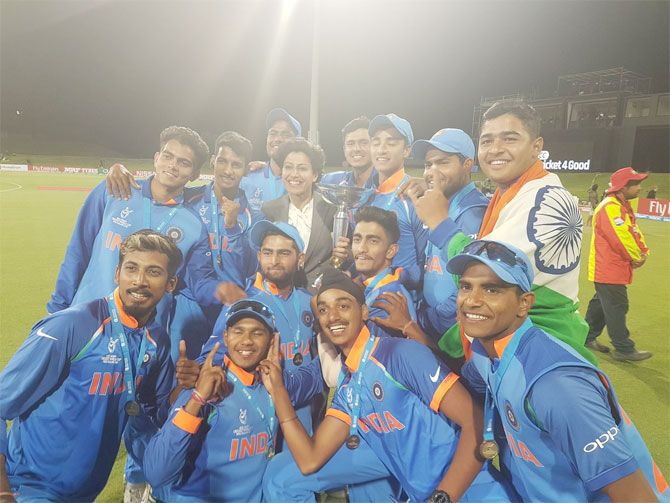 The victorious India U-19 team with former women's cricket captain Anjum Chopra on Saturday, February 3