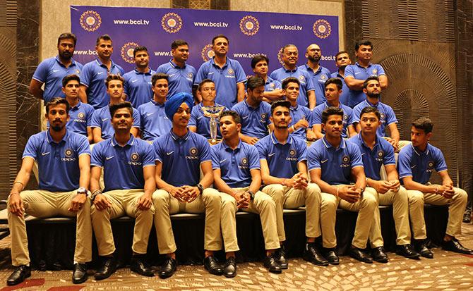 The victorious India Under-19 team and the support staff pose with the World Cup for a photo-op on Monday