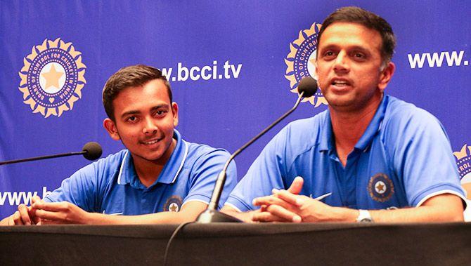 India Under-19 World Cup-winning Coach Rahul Dravid and Captain Prithvi Shaw at a media interaction on their arrival from New Zealand in Mumbai. Photograph: Satish Bodas/Rediff.com